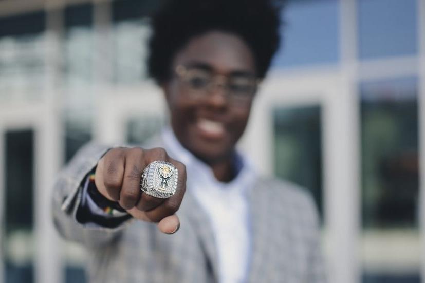 Ayanna Crenshaw ?23 shows off a ring she got as a sales intern with the Milwaukee Bucks.